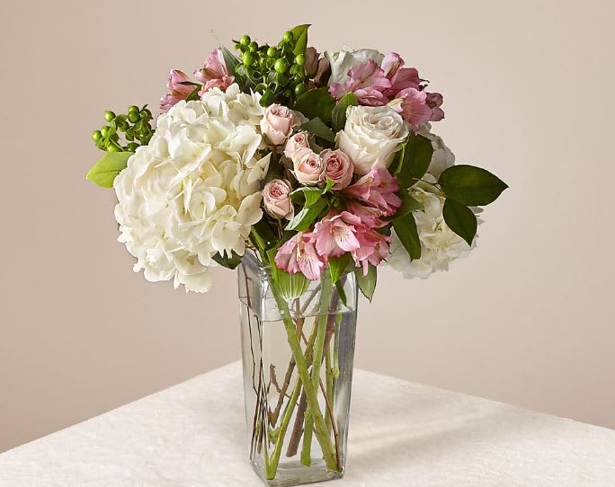 Rosé All Day Bouquet - Give the gift of surprise with a vase full of Rosé All Day. This blush beauty brings elegant excitement to end tables and entryways alike with its selection of roses, hydrangea, spray roses, and more.