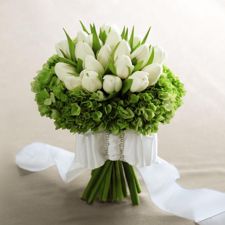 FTD Sunningdale Bouquet - The FTDÂ® Sunningdaleâ¢ Bouquet is the picture of modern perfection. White   tulips are arranged in the center of the bouquet and then surrounded by   green mini hydrangea blooms to create a memorable look. Accented with a   wide white French taffeta ribbon, this bouquet is an ideal way to walk   down the aisle in style and grace. Approx. 10âH x 13âW. 