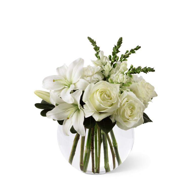FTD Special Blessings Bouquet - The FTDÂ® Special Blessingsâ¢ Bouquet is a brilliantly beautiful   arrangement to bring peace and comfort to your friends and family in   their time of need. White roses, Asiatic lilies, snapdragons and   carnations are offset by lush greens and seated in a clear glass bubble   bowl to create a lovely display of sweet serenity.      12âh x 10âw