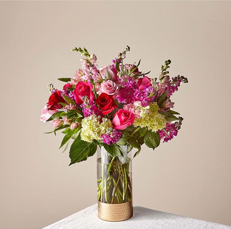 You &amp; Me Luxury Bouquet - The bouquet is about 27"H by 22"W. For long–lasting blooms replace water and trim stems daily. The bouquet pictured reflects our original design for this product. While we always try to follow the color palette, we may replace stems to deliver the freshest bouquet possible, and we may sometimes need to use a different vase.