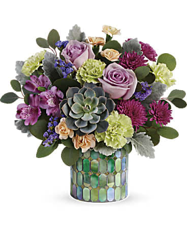 Mixed bouquet with lavender roses and a succulent in a mosaic vase