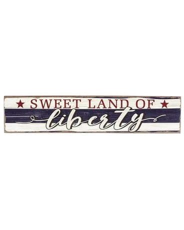 Rectangular patriotic wood sign reading 'Sweet Land of Liberty' in red, blue, and white lettering