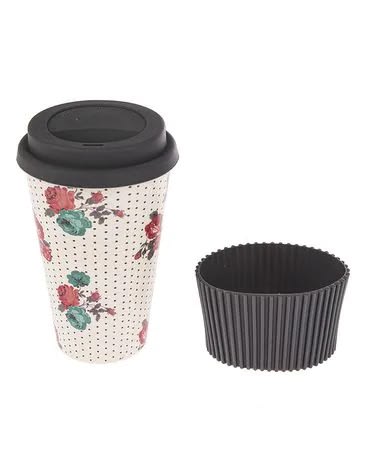 Floral-patterned takeaway coffee cup with a black lid and sleeve