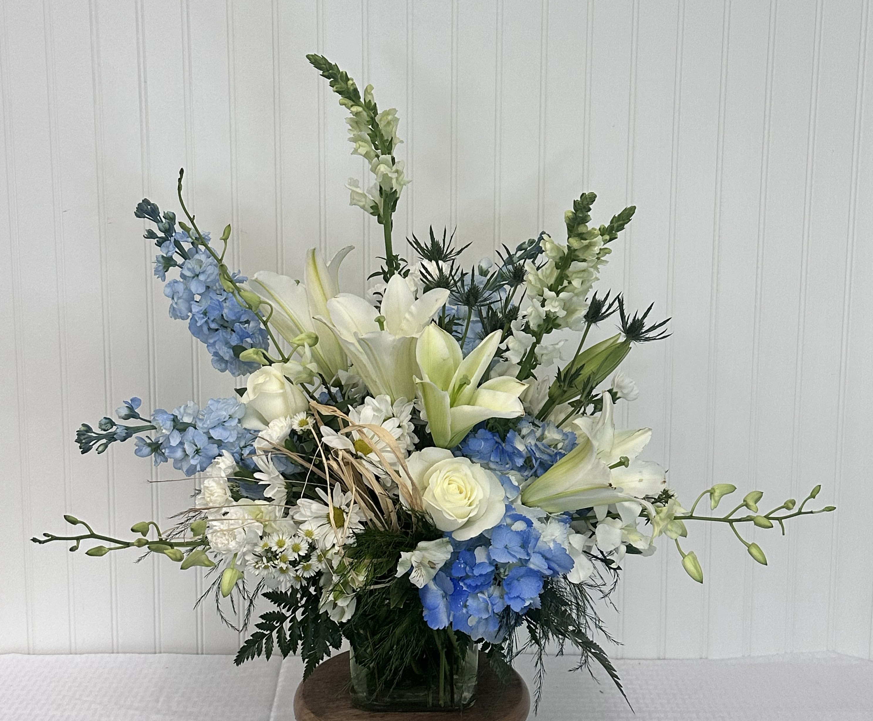 CU10 - Custom Cube Arrangement - Flowers and Containers are subject to substitution and availability.
