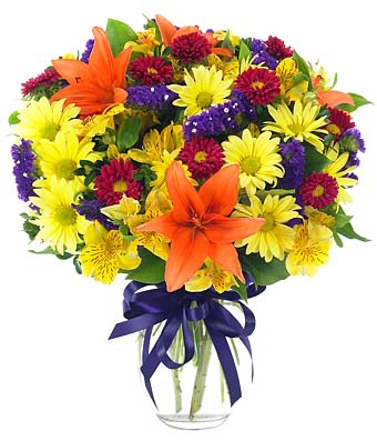 Today &amp; Everyday - Tell them how much they mean to you, now and always. This gorgeous mix of lilies, daisy poms, alstroemeria, statice and aster is perfectly complemented by a clear vase boasting a purple organza ribbon. Small Measures 14"H by 11". Medium Measures 15"H by 11"L. Large Measures 16"H by 12"L.