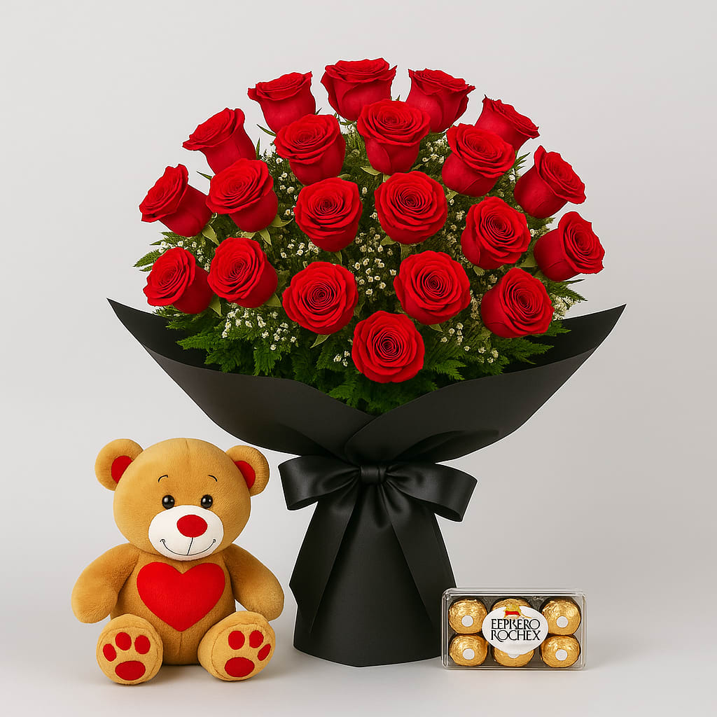 Bouquet of red roses with a teddy bear and a box of chocolates