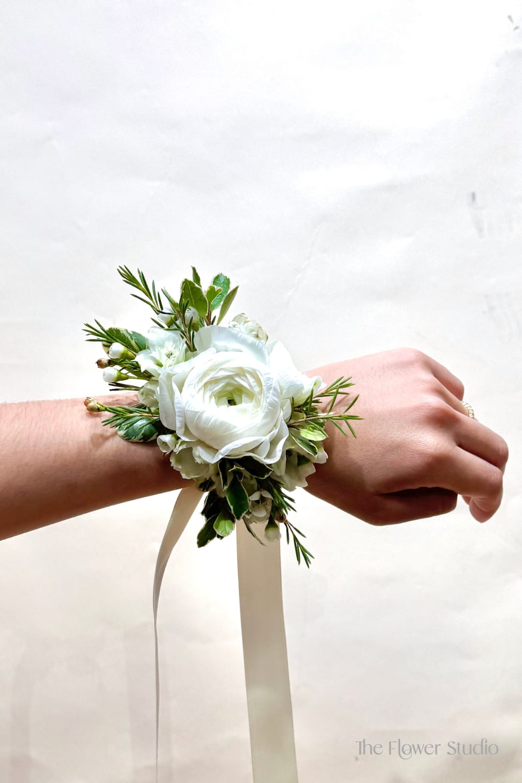 Wristlet Corsage -  - Super pretty wrist corsage!  Made to order.  We will match any color dress.  Spray roses color will vary according with availability / white, pink, blush, red.  IT HAS TO BE PLACED 48 HOURS PRIOR, THE'RE CUSTOME MADE!!  If you have a preference, let us know.   Perfect for father daughter dance, homecoming.   We do recommend this corsage for a petite/young size.