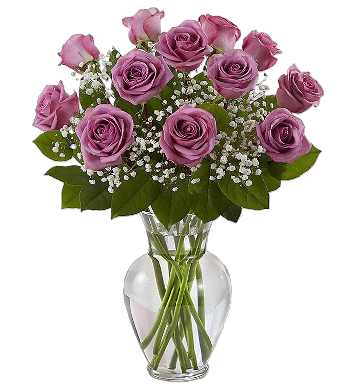 Pink roses arranged in a clear glass vase with baby's breath