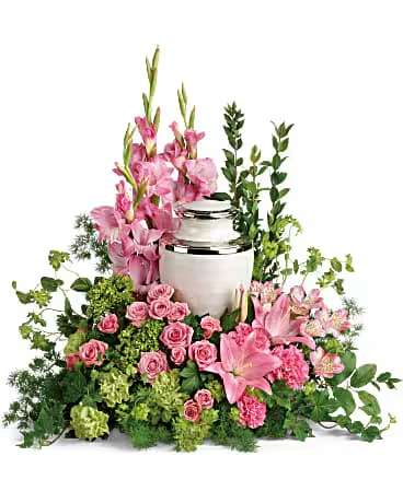 Sacred Solace Urn Surround - Surround the cremation urn with gorgeous, graceful pink blooms that show deep gratitude for a beautiful life.