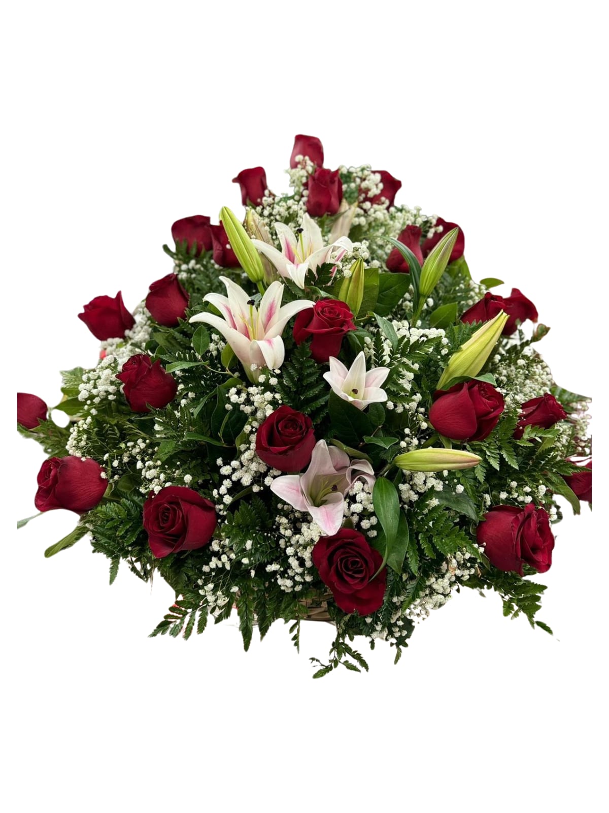 Red roses and white lilies arranged in a low bouquet