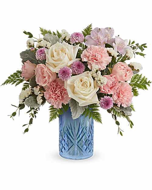 Blue Belle - Blue Belle Bouquet is a sweet Mother's Day flower arrangement of soft pink, white, and lavender blooms, beautifully presented in the Blue Belle Vase keepsake-perfect for celebrating Mom with fresh spring charm.