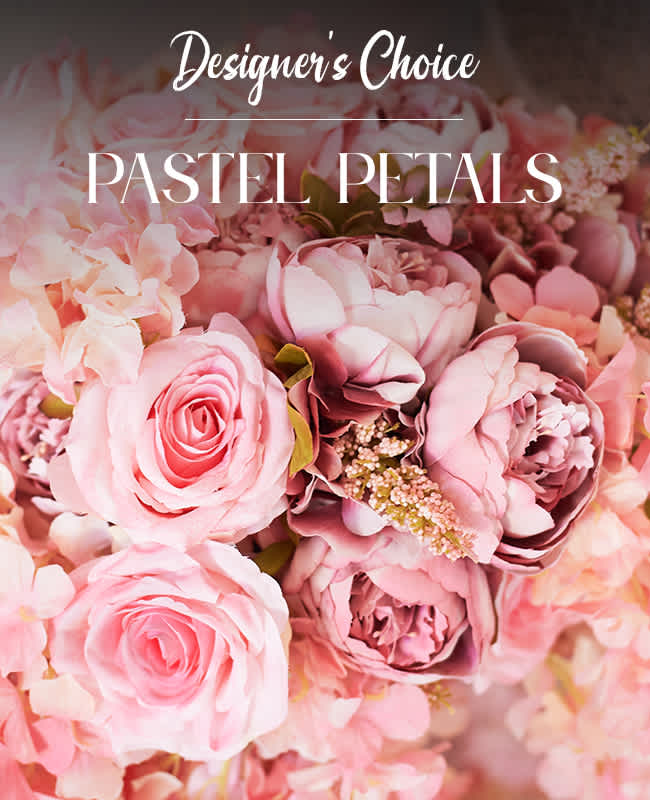 Pink roses and peonies in a pastel floral arrangement