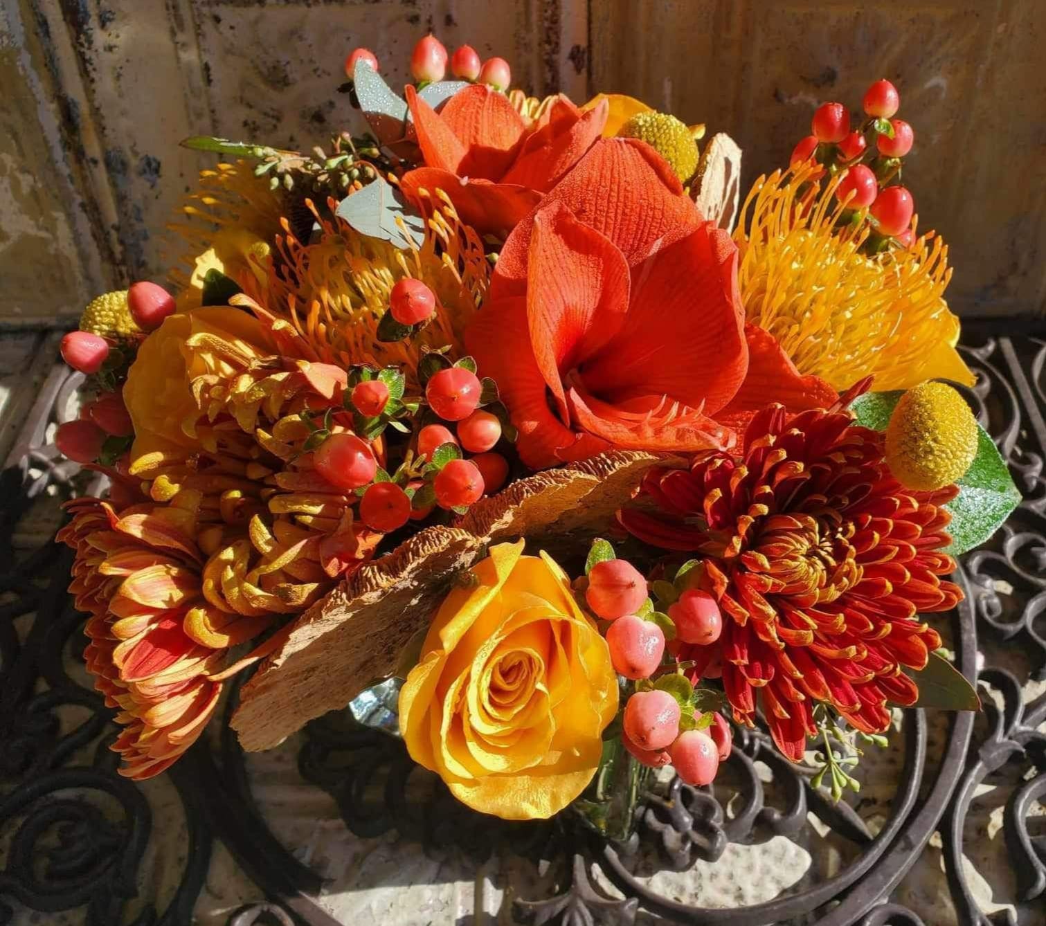 Orange and yellow bouquet with roses and mums