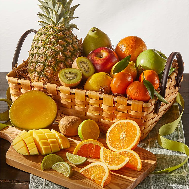 Tropical Fruits Gift Basket - Gift the gift of the tropics with this sweet fruit basket! This set includes Mango, Pineapple, Pear, Kiwis, Apples, Oranges, Lemons, and Lime.