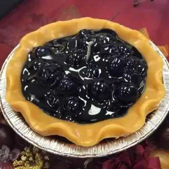 5" Blueberry Pie Tart Candle - Beautifully crafted pie tart candle that gives off aroma without having to be lit. Just set these out to enjoy the deep rich scent and the beautiful appearance.  Made in United States  Weight: 1 lb (453.59 g)  Dimensions: 6 x 6 x 4 in (15.2 x 15.2 x 10.2 cm) 