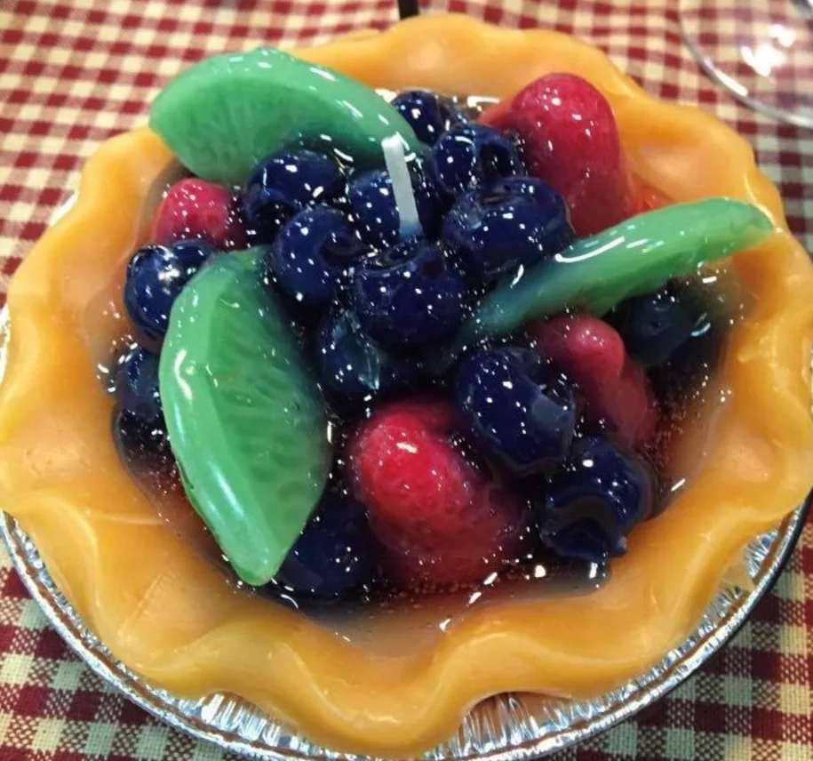 5" Fruit Pie Tart Candle - Beautifully crafted pie tart candle that gives off aroma without having to be lit. Just set these out to enjoy the deep rich scent and the beautiful appearance.  Made in United States  Weight: 1 lb (453.59 g)  Dimensions: 6 x 6 x 4 in (15.2 x 15.2 x 10.2 cm)