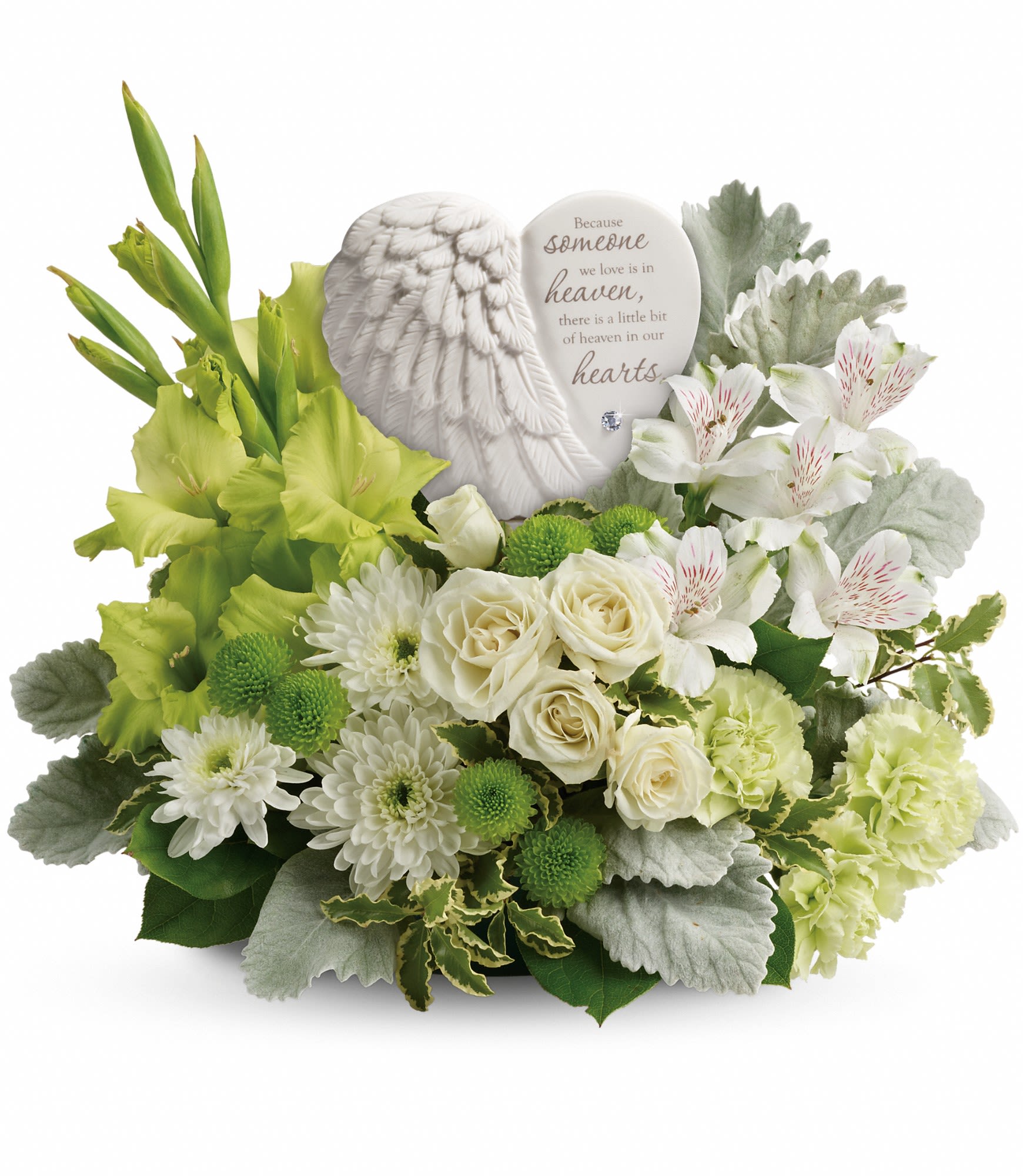 White sympathy bouquet with roses, lilies, and a memorial angel plaque