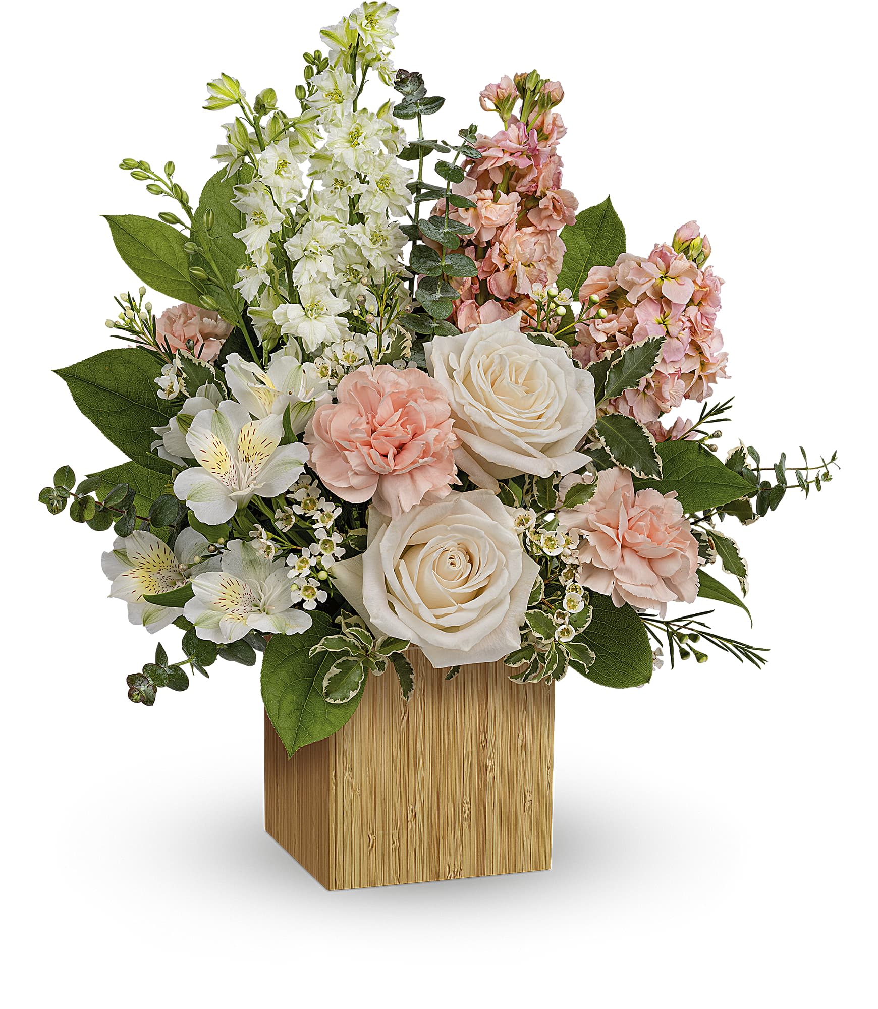 Pink and white floral arrangement in a wooden cube vase