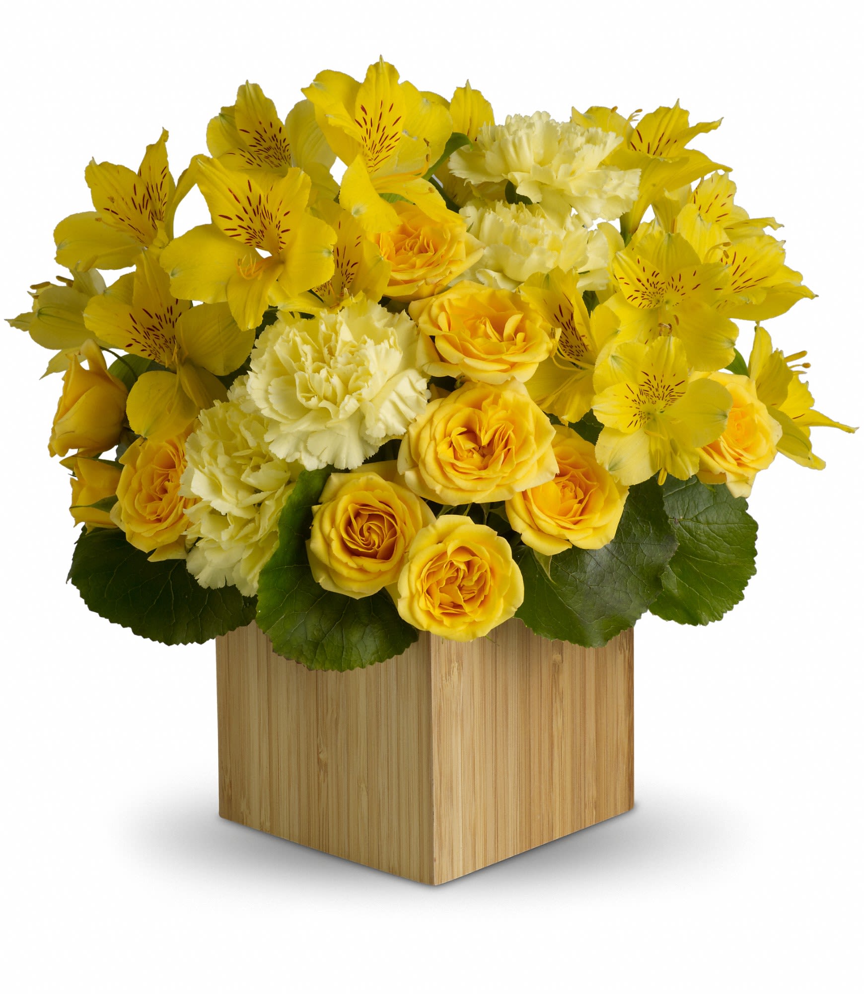 Yellow roses and alstroemeria in a wooden cube vase