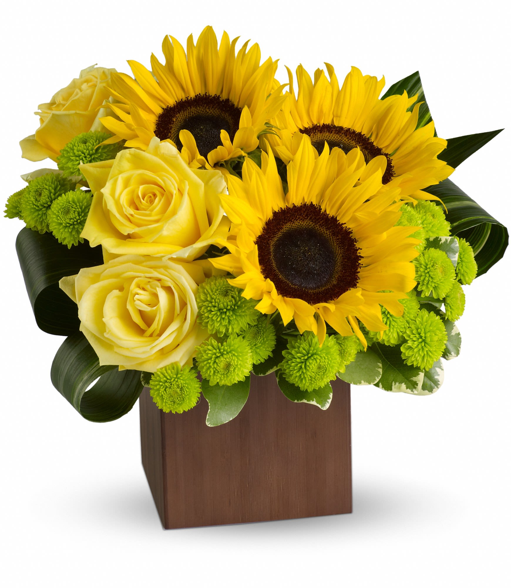 Yellow roses and sunflowers in a wooden cube vase