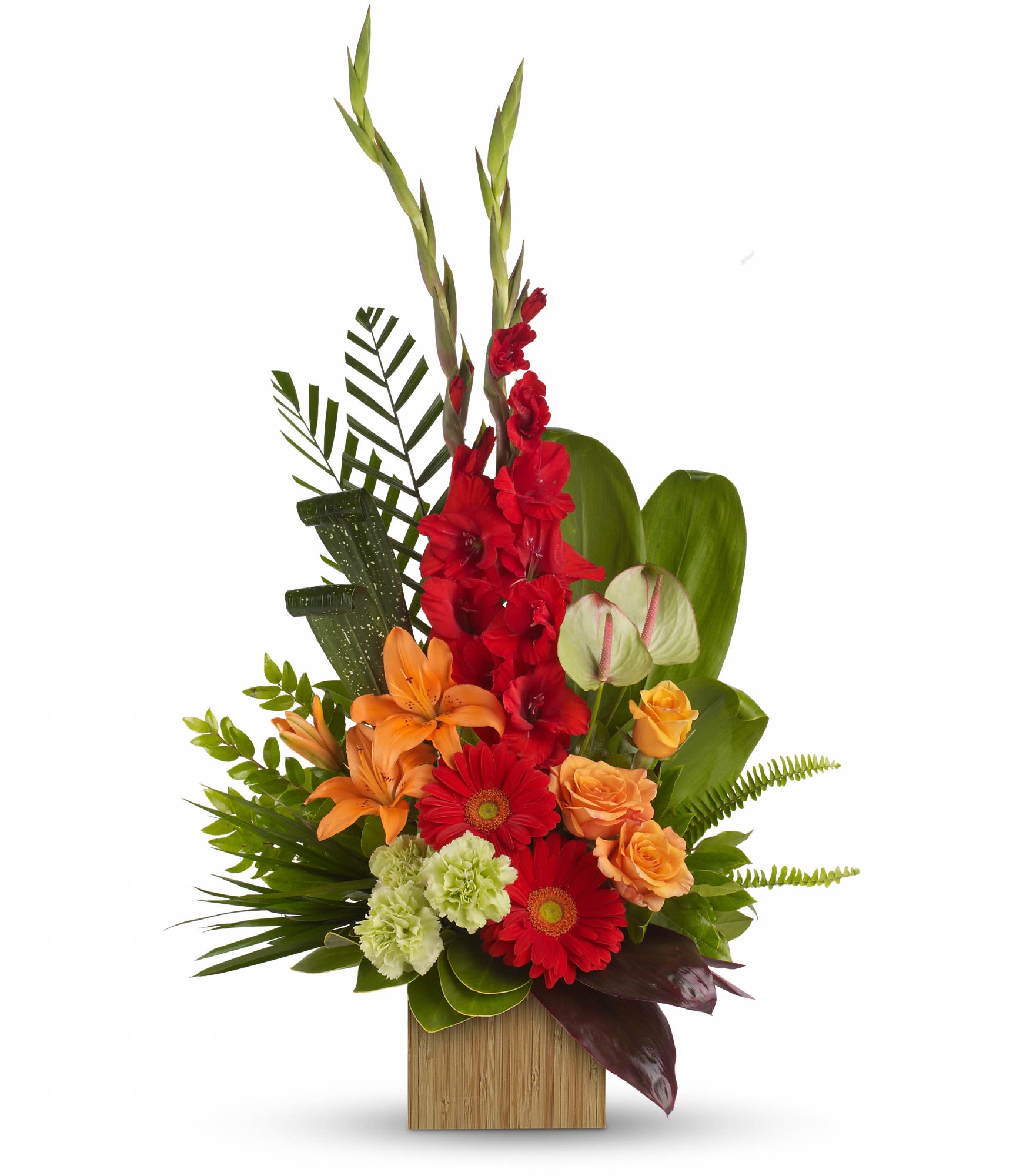 Tropical floral arrangement with red, orange, and green blooms in a wooden container