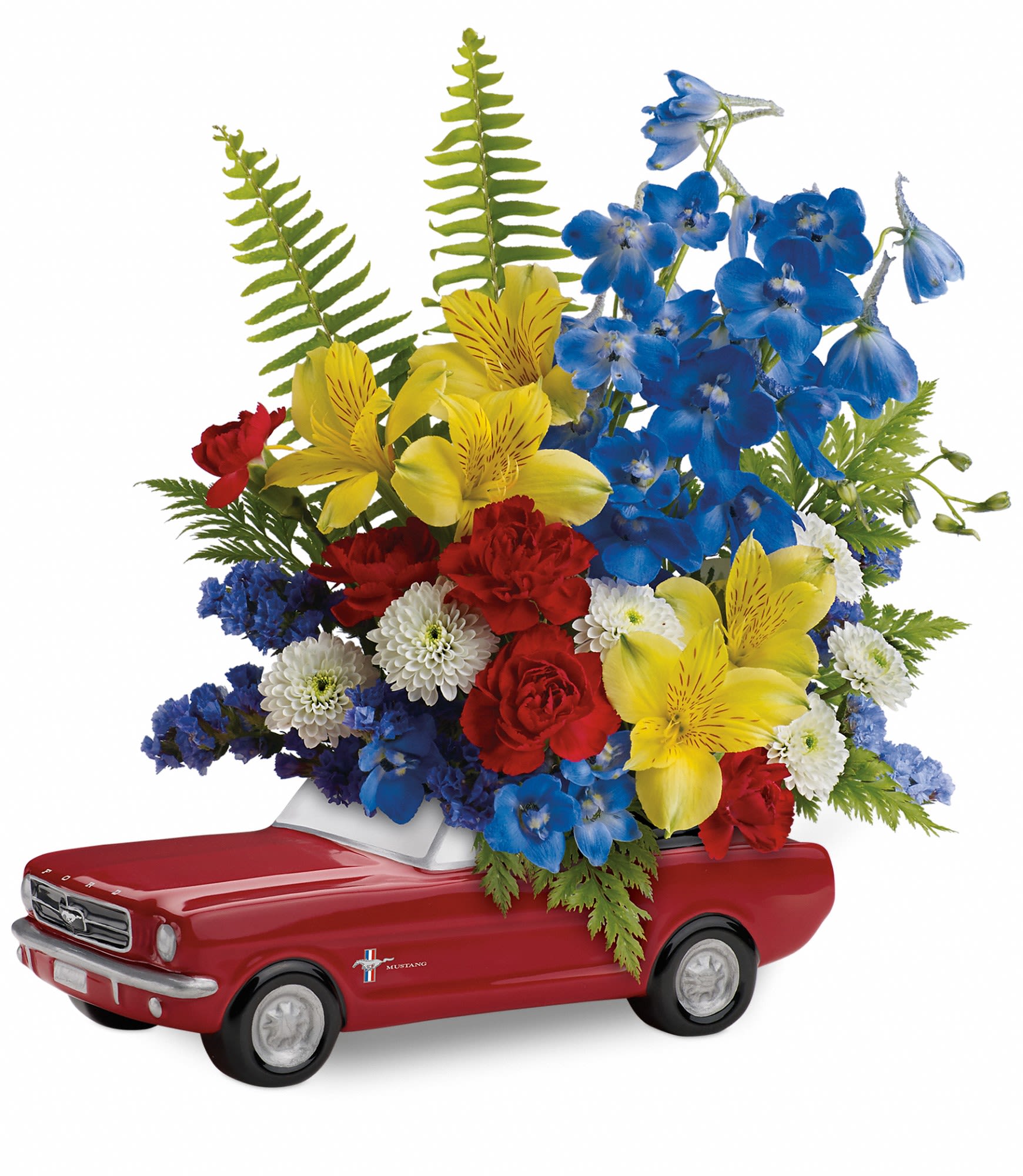 65 Ford Mustang Bouquet - Vroom, vroom! Get his motor running this day with a freewheelin' gift he'll never forget - a bold bouquet of alstroemeria, carnations and mums, hand-delivered in a '65 Ford Mustang convertible keepsake. Hand-painted in classic poppy red, this ceramic collectible is one-of-a-kind, just like Dad.