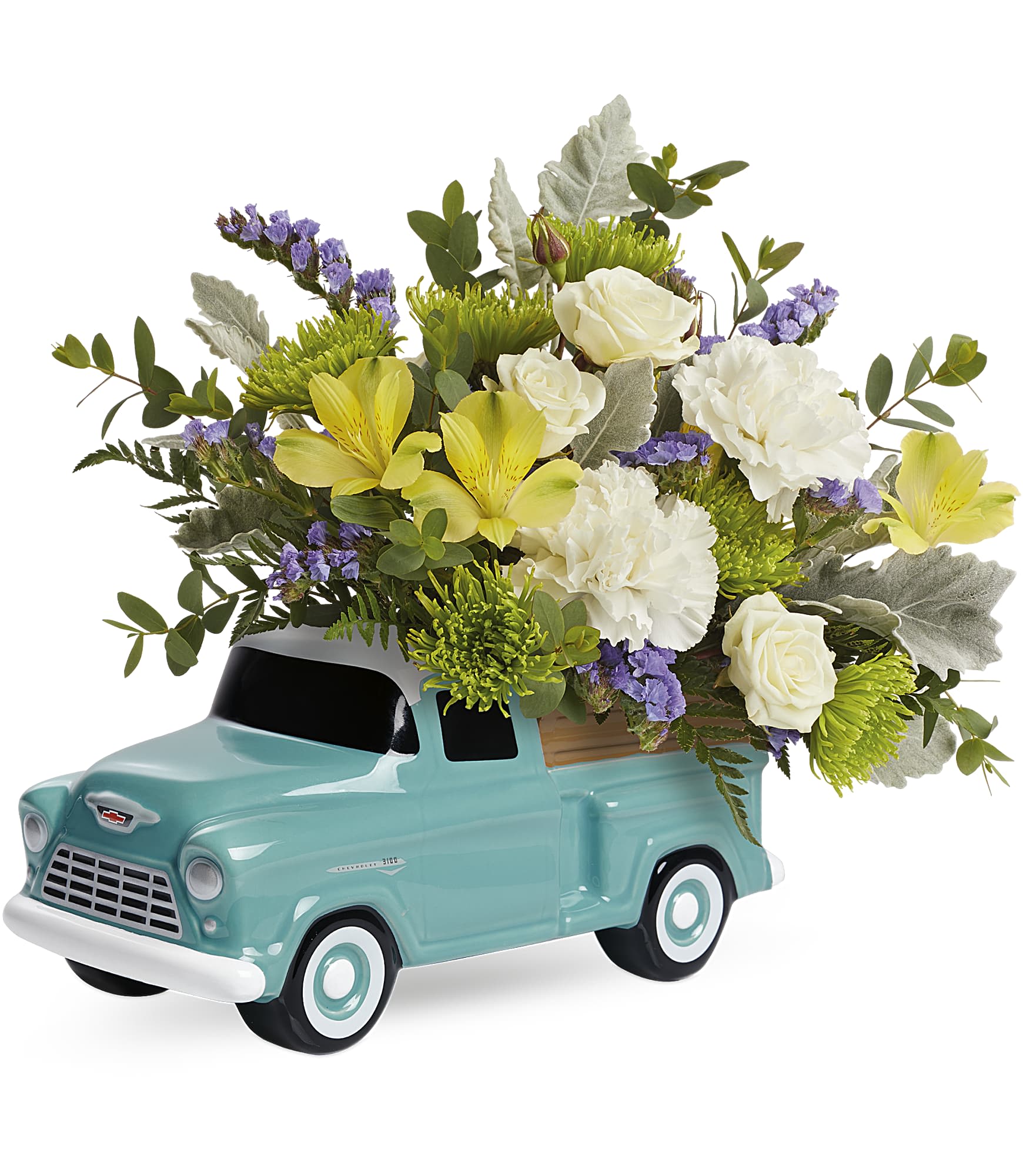 Flower arrangement in a turquoise ceramic truck planter