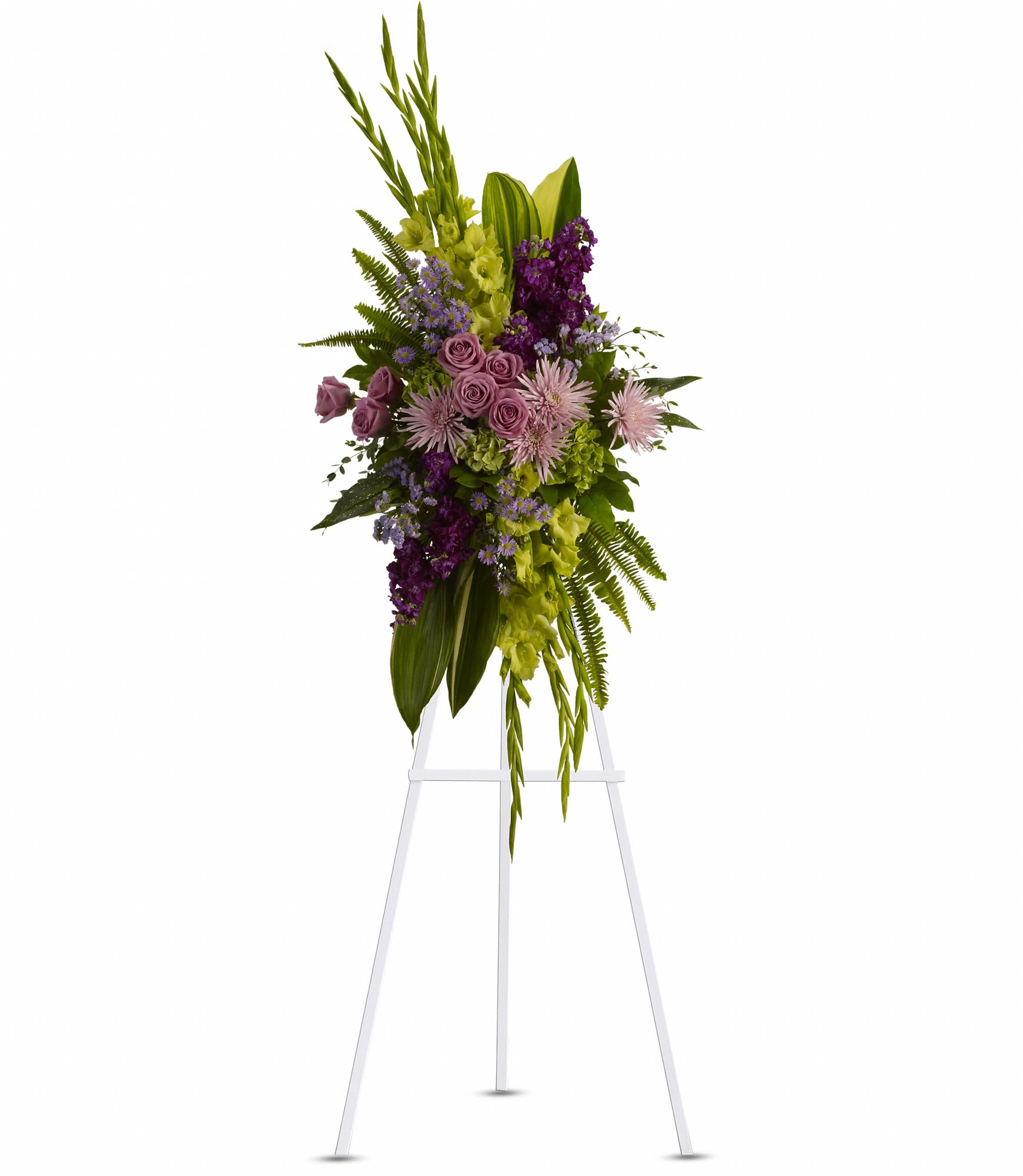 Tall floral standing spray with purple and green flowers on a white easel