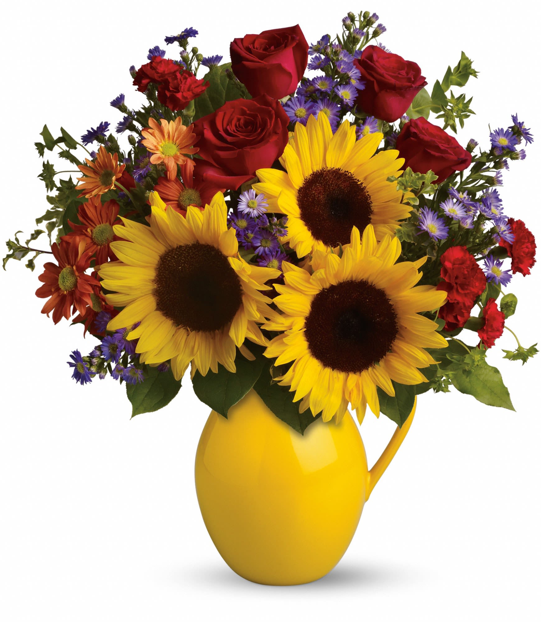 Bouquet of sunflowers, red roses, and mixed daisies in a yellow pitcher vase