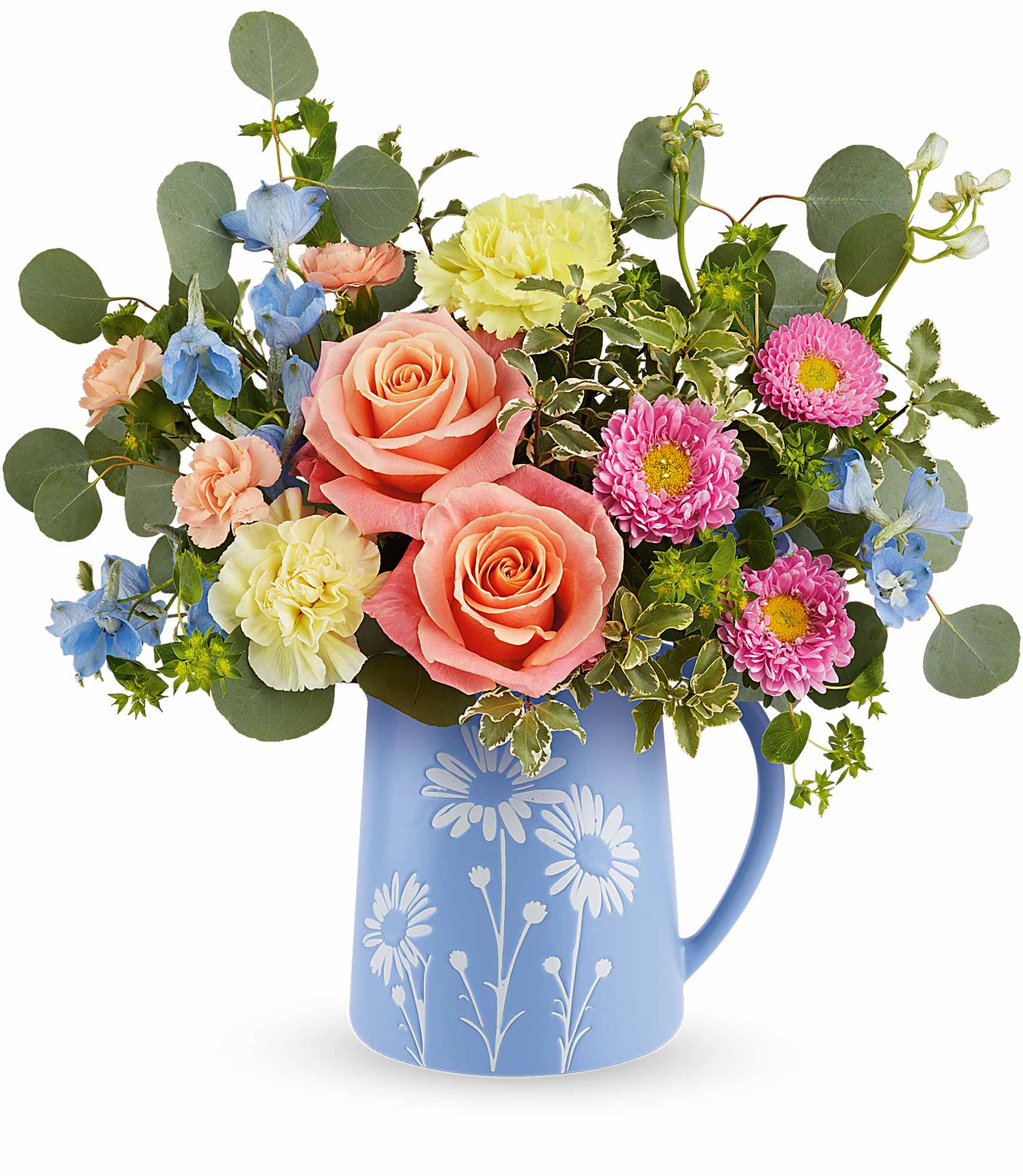 Daisy Dreams Bouquet - Brimming with fresh-picked charm, Our Daisy Dreams Bouquet delights with peach roses, yellow carnations, and cheerful blooms arranged in a food-safe blue pitcher adorned with a sweet white daisy design.