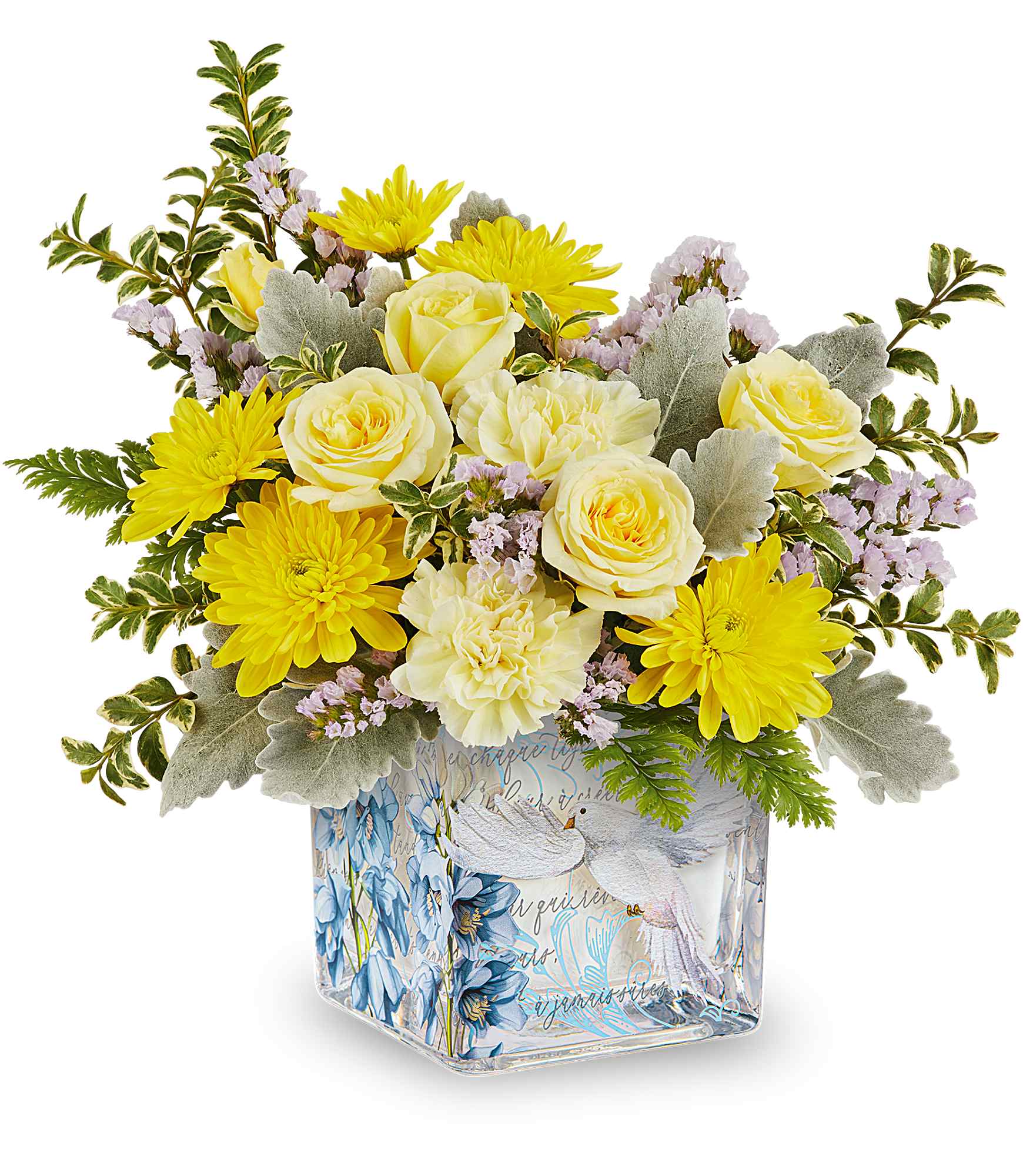  Wings of Light Bouquet - Bright and inspiring, Our Wings of Light Bouquet glows with soft yellow blooms and delicate lavender accents, beautifully arranged in a keepsake glass cube adorned with graceful doves and blossoms-a radiant gift of peace and comfort.