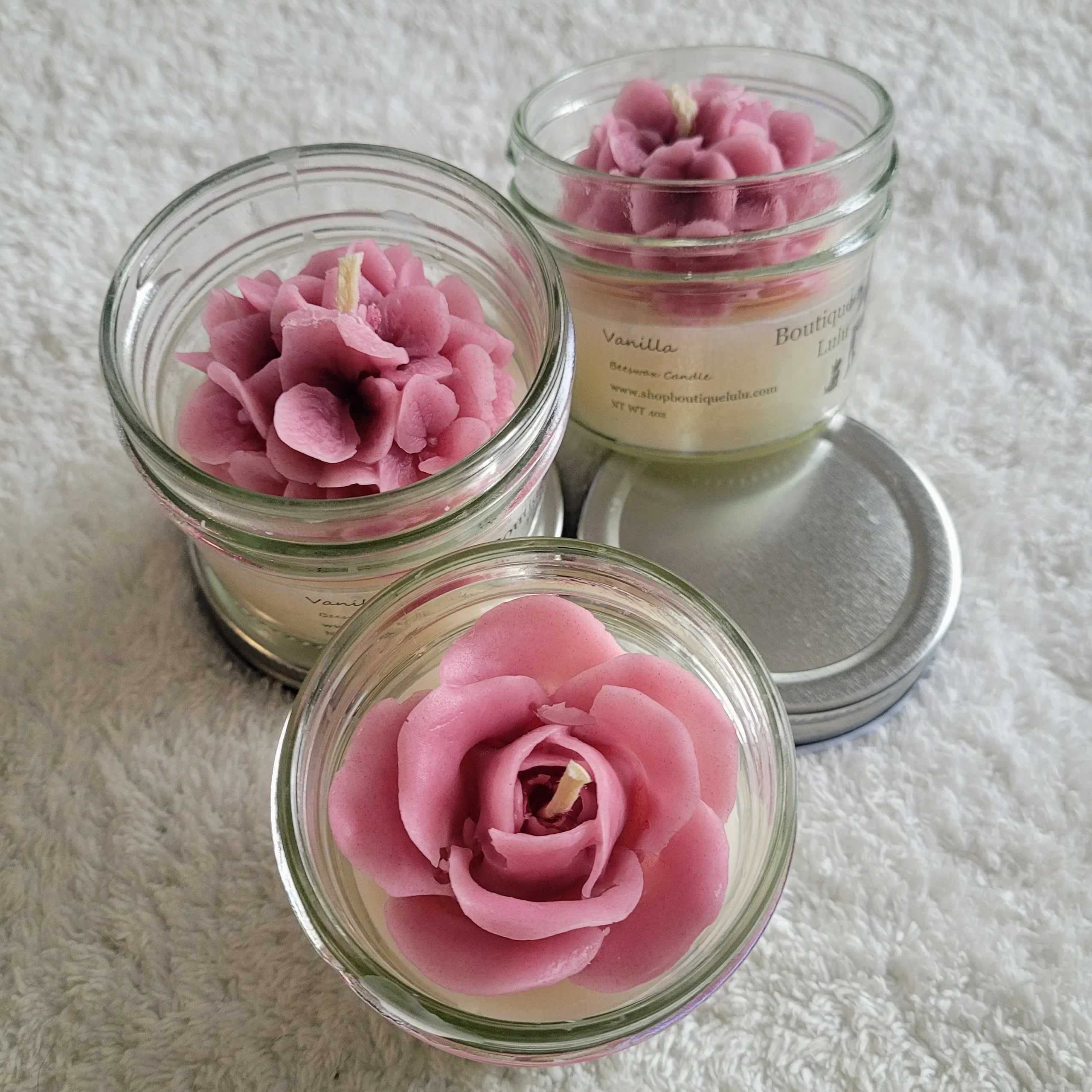 Vanilla Candles - Candle made with all natural beeswax and organic coconut oil. All candles are lightly scented with essential oils for a natural burn. Food grade plant-based material is used for all coloring in these candles, such as flowers, fruit, leaves. All candles comes with a cotton wick. These candles are hand poured in small batches into 4oz mason jars and formed to mimic flowers. Coloring may vary.