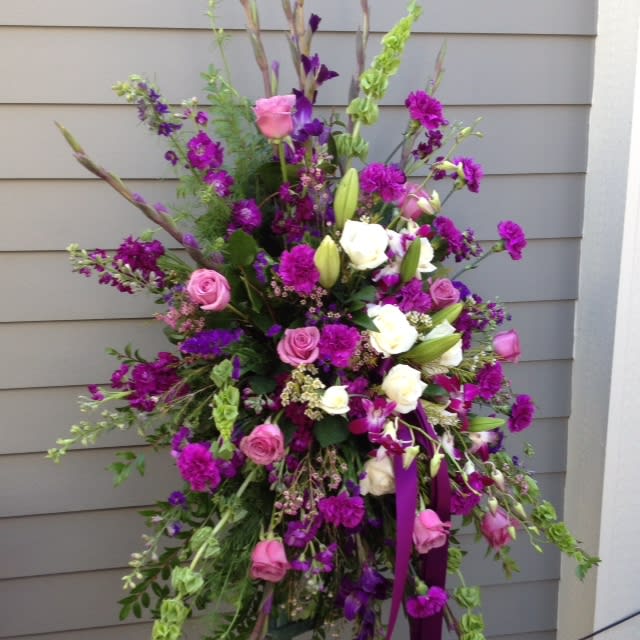 Tall floral spray with pink, white, and purple flowers
