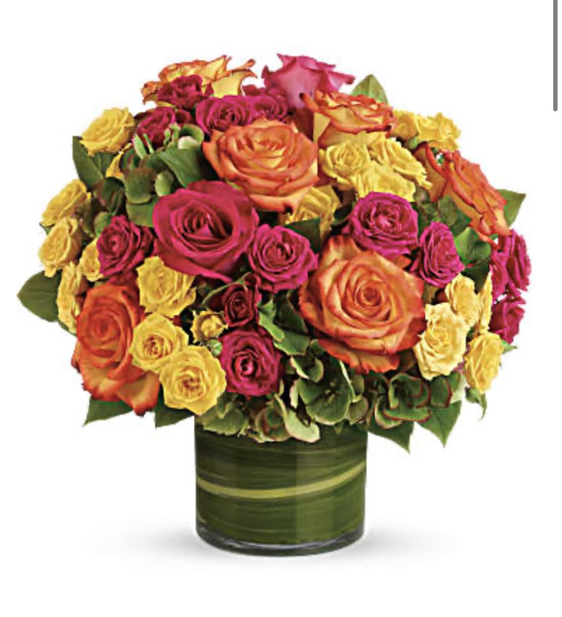 Bouquet of orange, pink, and yellow roses in a green glass vase