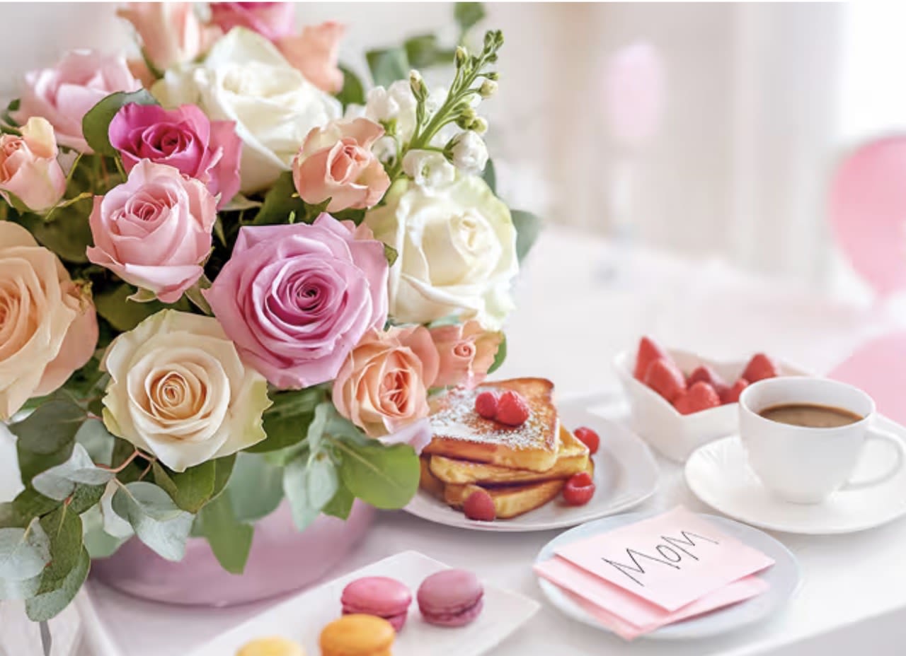 Flower box with mixer roses  - A charming pink flower box filled with a beautiful selection of mixed-tone roses, delicately arranged with fresh eucalyptus and elegant stocks. This lovely combination creates a soft, romantic, and refreshing look that brightens any moment.  Perfect for a breakfast surprise, brunch setting, or simply to say “you are special to me.” A thoughtful and stylish gift that speaks with beauty and grace.   A delicate expression of love, appreciation, and joy.