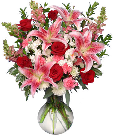 PERFECT LOVE BOUQUET - .On this most romantic day of the year you can choose a simple bouquet with a loving message or you can be wildly extravagant and choose a large bouquet with , chocolates or cuddly Stuffed Animal to accompany your romantic message. Whatever you choose, our Valentine's Day flowers are the perfect way to make this a truly unforgettable occasion of pure romance.This stylish bouquet is bursting with Stargazer' lilies,red roses,snapdragons, PERFECT LOVE BOUQUET to express your love and affection.