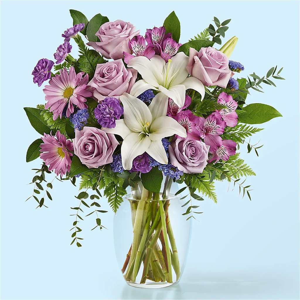 The Dreamscape Bouquet - Teleport to a dreamland like no other with the soothing lavender stems of our Dreamscape Bouquet. This gift is ideal for sending a hug near or fa