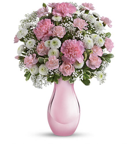 Pink and white bouquet in a pink glass vase