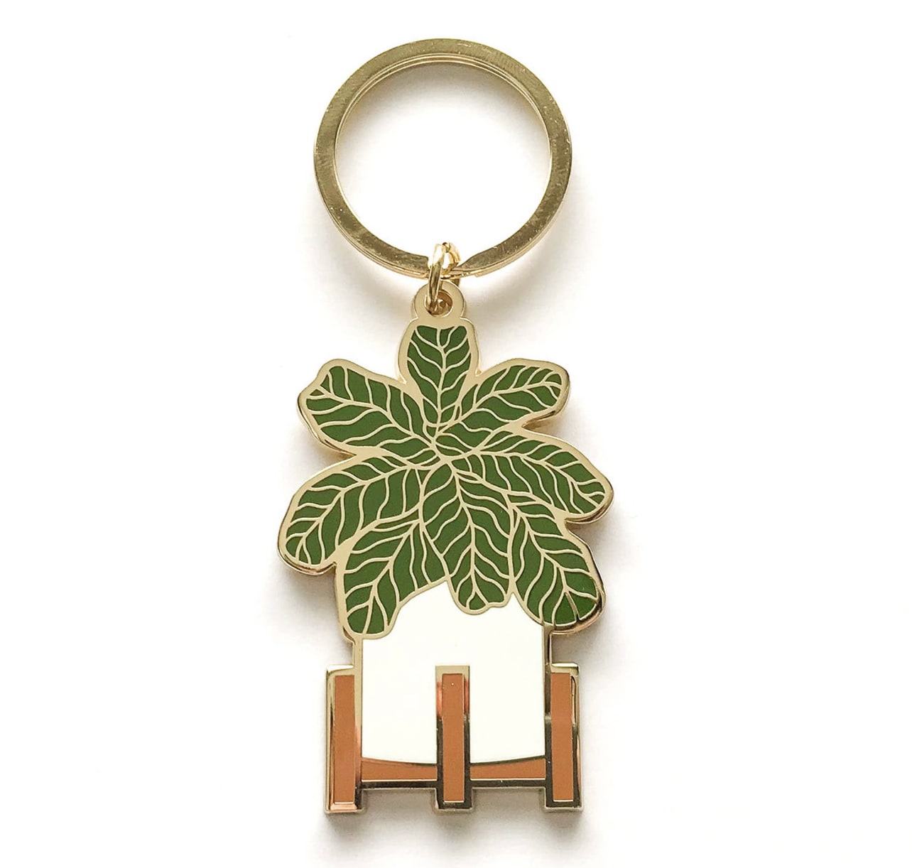 Keychain with a green leaf-shaped charm and metal ring