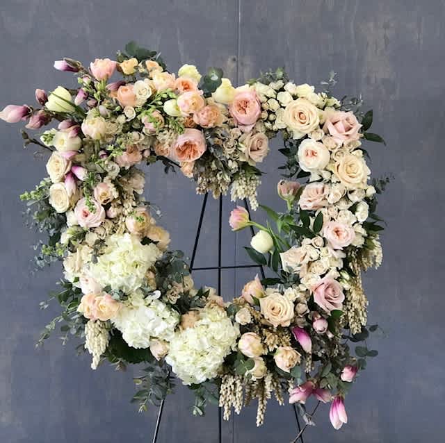 Heart Shaped Sympathy Wreath - This wreath is large in size.  We use the best of what is in season and can customize any color palette requested.