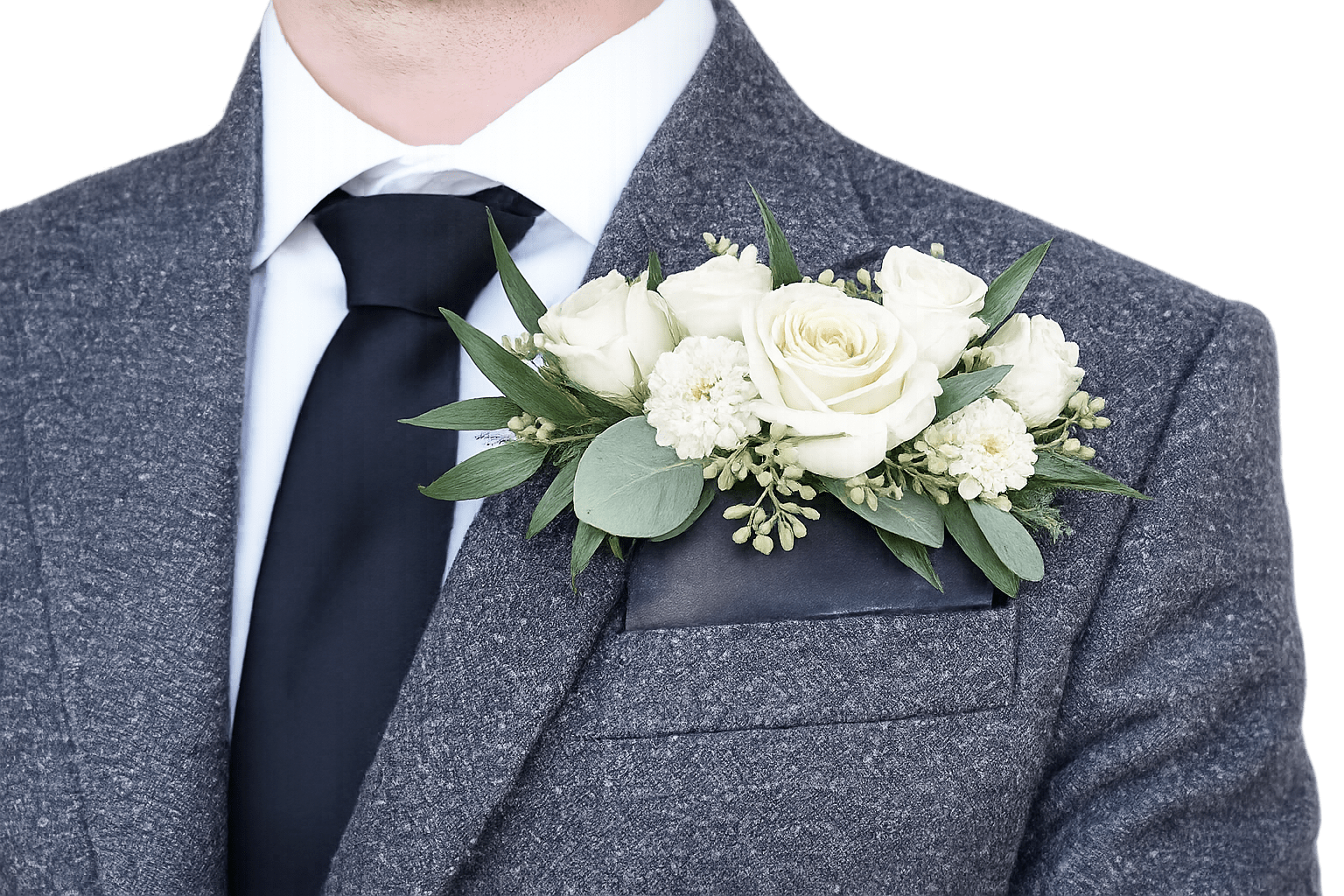 Pocket Square Boutonniere - A modern twist on a classic detail, our pocket square boutonnières are designed to make a refined statement without the need for pinning. Carefully arranged with fresh, high-quality blooms and textured greenery, each piece is styled to sit seamlessly within the pocket for a clean, tailored look. Perfect for weddings and formal events, this elevated design offers a fuller, more polished appearance while coordinating effortlessly with your overall florals.