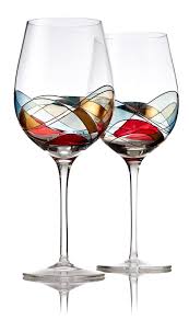 Two clear wine glasses with colorful abstract patterns