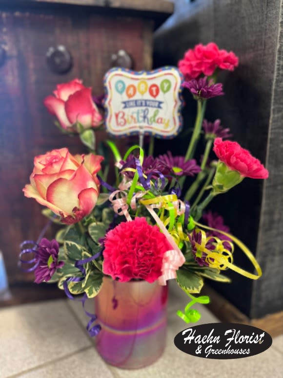 Birthday bouquet with pink roses and carnations in a vase
