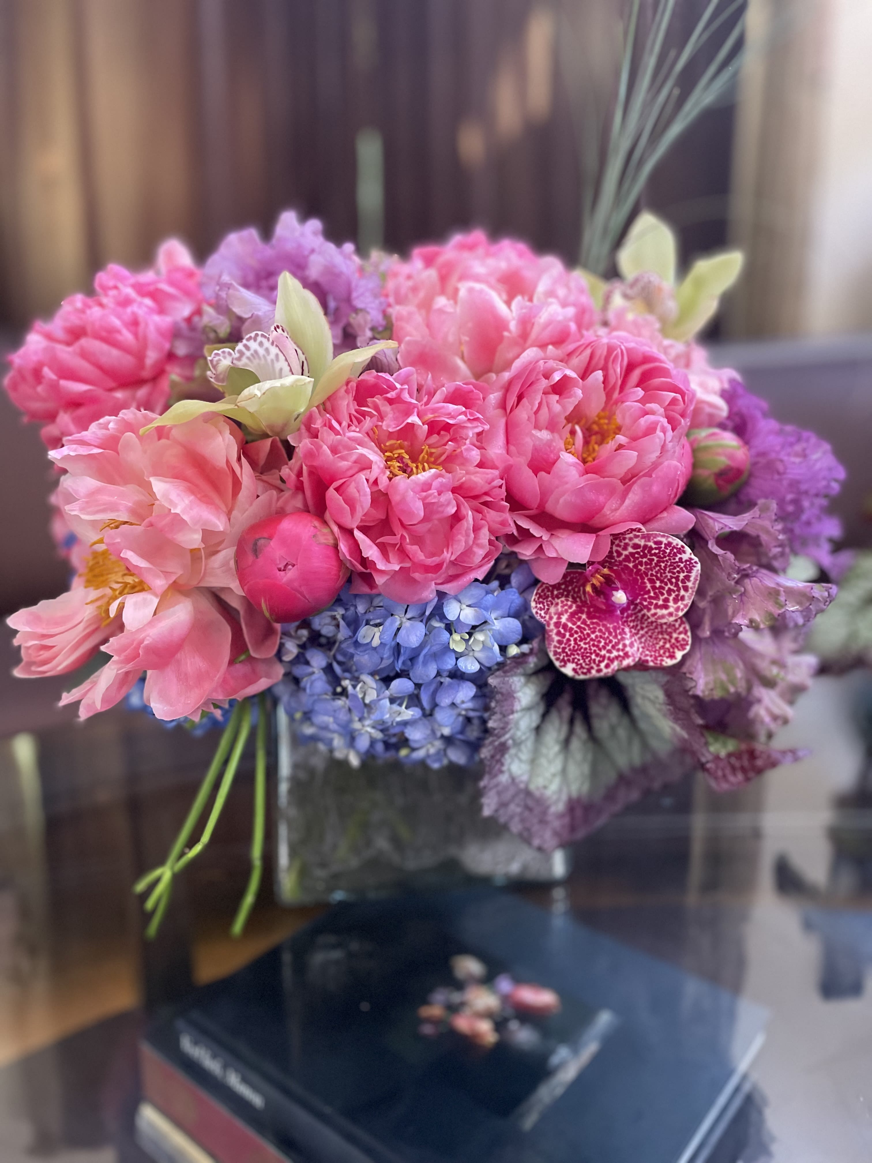 Pink and purple bouquet in a glass vase