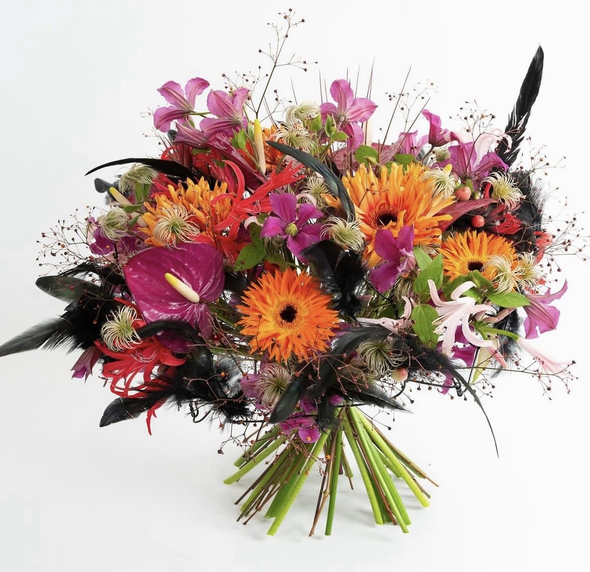 Bright mixed bouquet with orange gerbera daisies and pink flowers