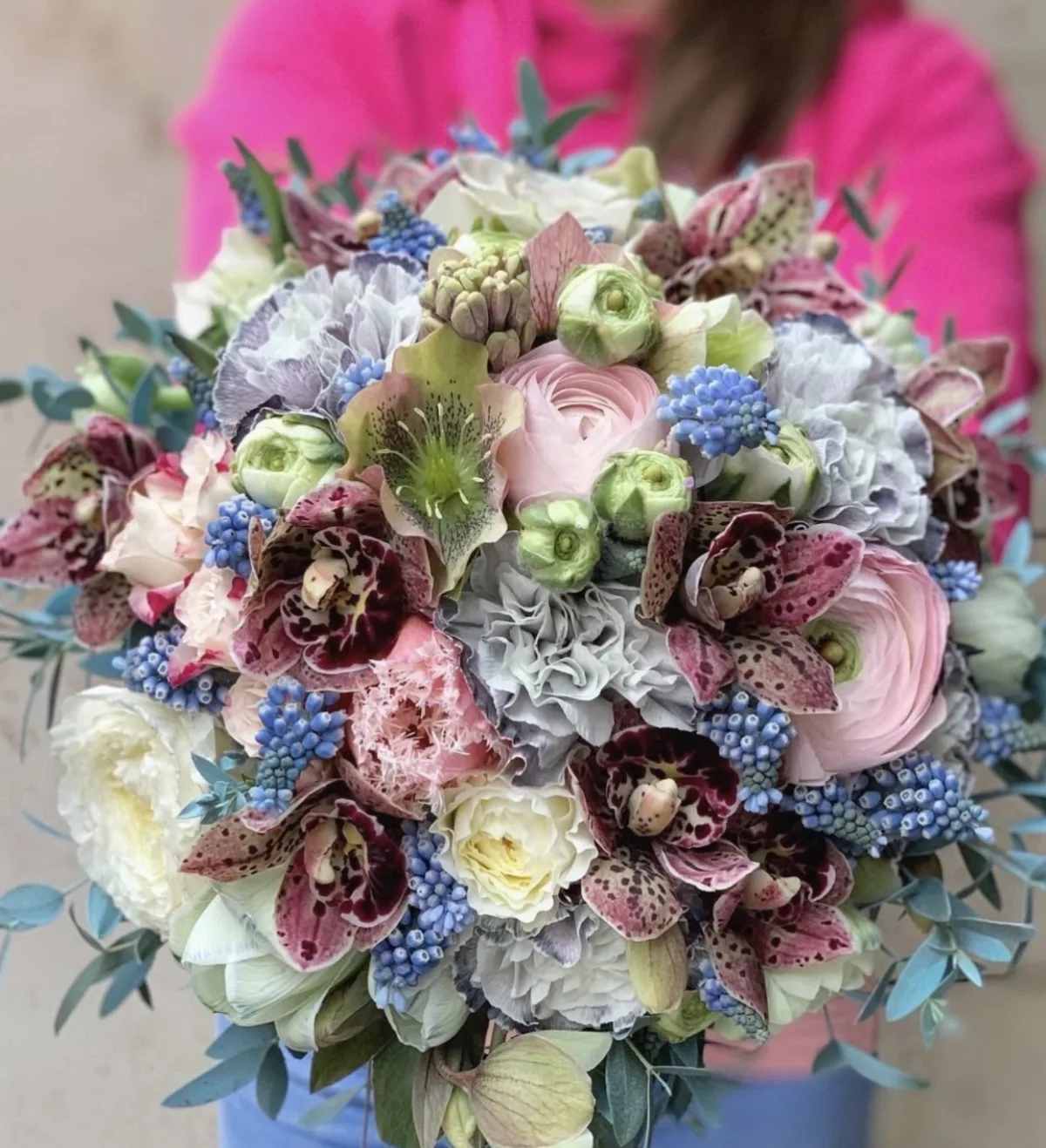 Pastel bouquet with pink, white, and blue flowers