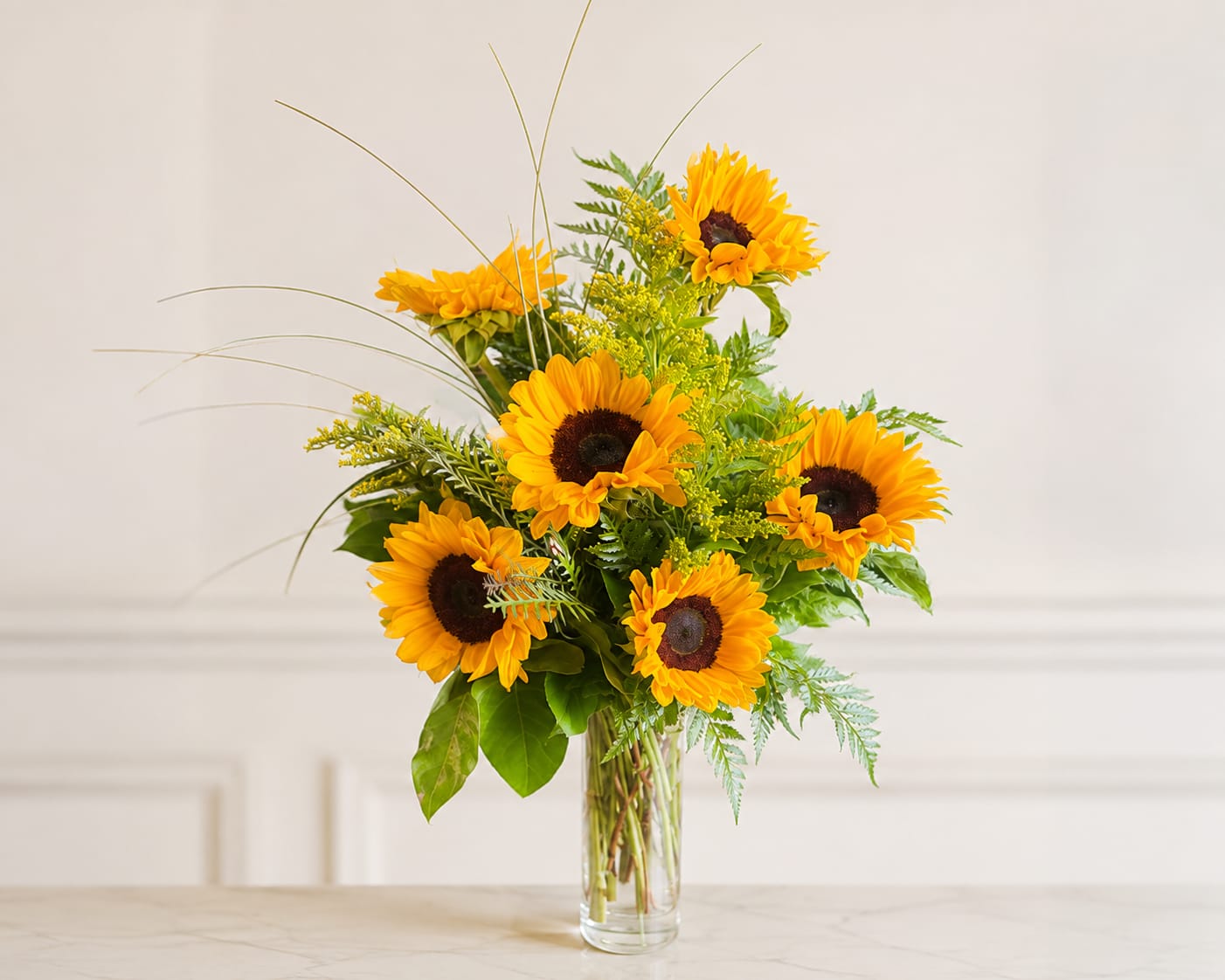 Sunflower bouquet in a clear glass vase
