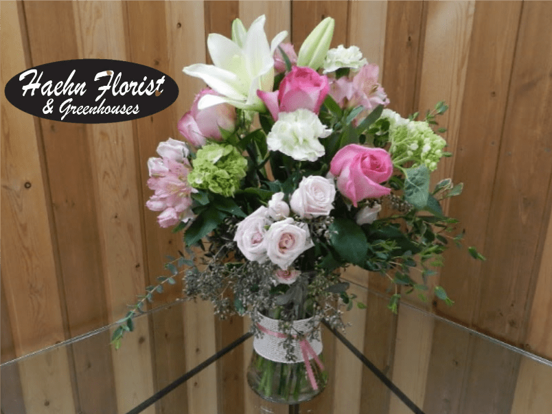 Pink and white mixed bouquet in a glass vase