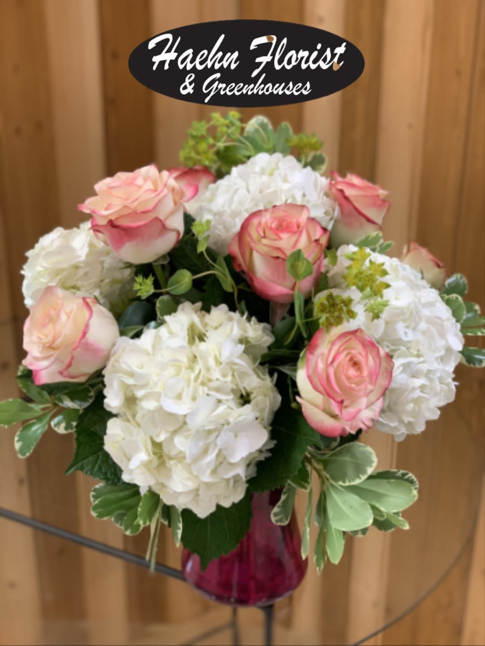 Classy Bouquet - Classy Bouquet – Fresh Roses &amp; Hydrangeas in a Vase  Elevate any occasion with our Classy Bouquet, a timeless fresh flower arrangement exclusively designed at Haehn Florist &amp; Greenhouses in Wapakoneta, Ohio. This stunning vase arrangement features premium roses and lush hydrangeas, artfully arranged to create an elegant display of beauty and sophistication. Perfect for birthdays, anniversaries, sympathy tributes, or simply to brighten someone’s day, the Classy Bouquet delivers a heartfelt message with classic charm.  At Haehn Florist, we take pride in using only the freshest flowers, ensuring every bouquet is long-lasting and beautifully presented. Our skilled floral designers thoughtfully handcraft each arrangement, making it a one-of-a-kind gift that will leave a lasting impression.   Visit us at: 410 Hamilton Rd., Wapakoneta, OH 45895  Call us: 419-738-8485  Whether you’re searching for elegant roses, hydrangea arrangements, or a florist near Wapakoneta who delivers with care, the Classy Bouquet is the perfect choice. Order today from Haehn Florist &amp; Greenhouses and let us help you celebrate life’s most meaningful moments with flowers.
