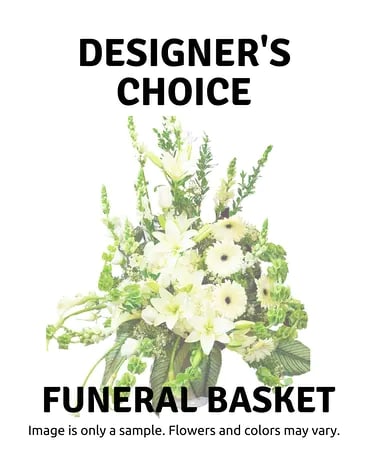 White floral funeral basket with lilies and green accents
